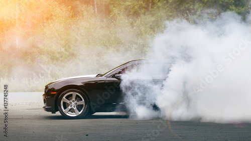 Drift - muscle car makes smoke