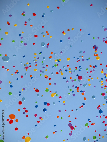 Multi colored balloons on a blue sky