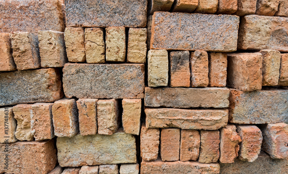Fototapeta premium Stack of red bricks.