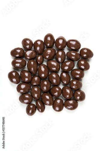 Milk chocolate almonds isolated on a white background