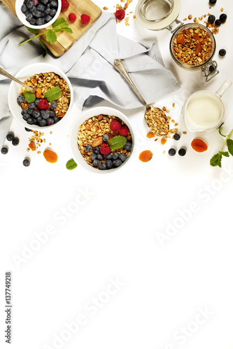Fototapeta Naklejka Na Ścianę i Meble -  Healthy breakfast -  Homemade granola, honey, milk and berries