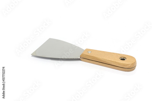 Metal spatula on white background