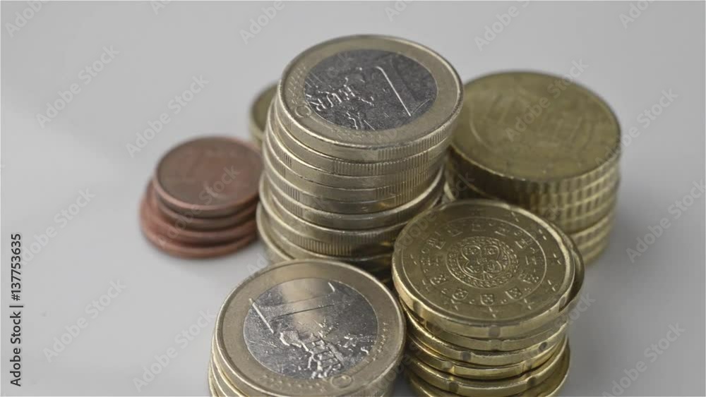 Close-up of a pile of euro coins rotating
Close-up of a pile of euro coins rotating