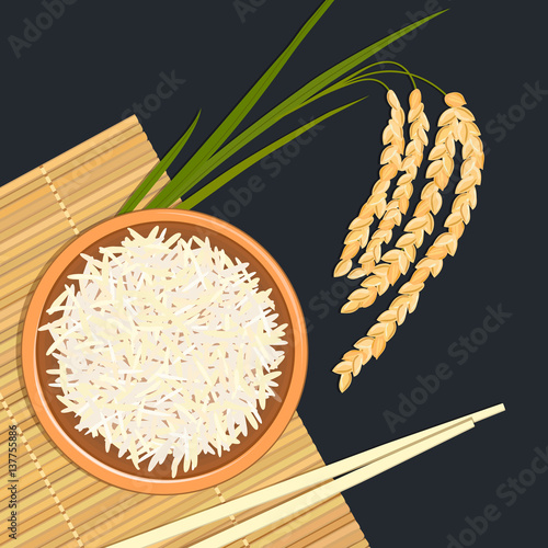 Rice in ceramic bowl with chopsticks. Kitchen bamboo mat, rice twig