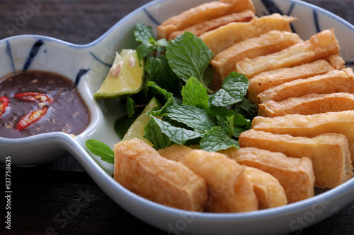 family meal, fried tofu with shrimp paste photo