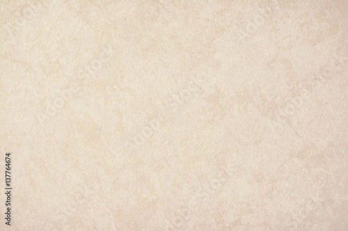 gold texture background paper in yellow vintage cream or beige color, parchment paper, abstract pastel gold gradient with brown, solid website background