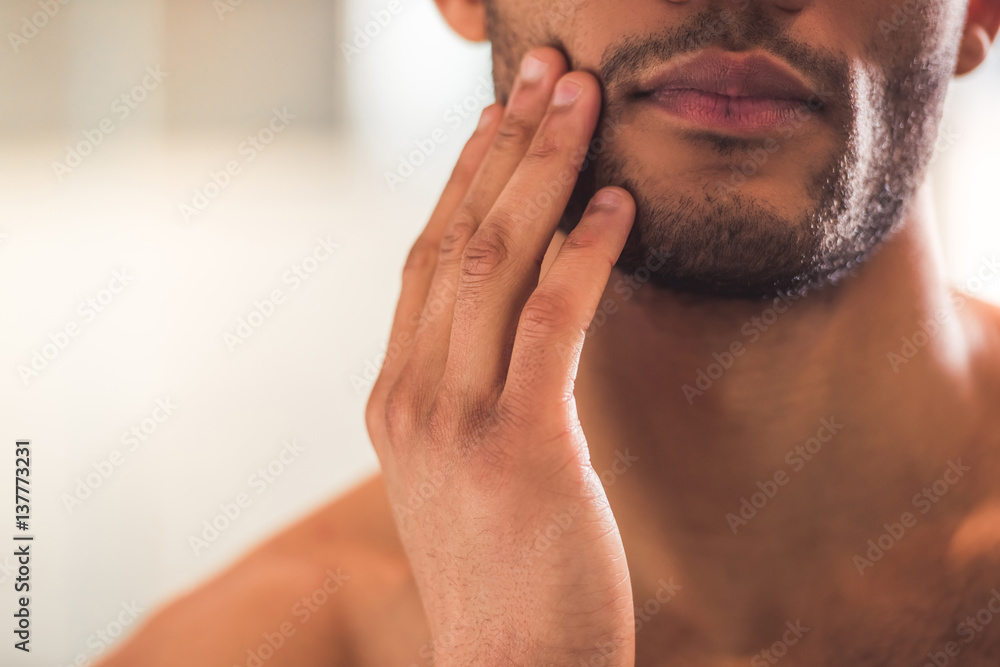 Fototapeta premium Afro American man in bathroom