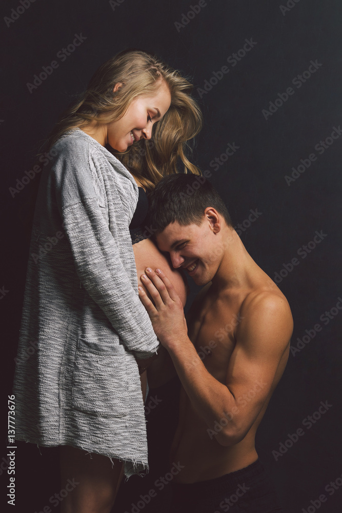 Young couple awaiting for birth of theirs baby. Young couple awaiting for birth of theirs baby.
