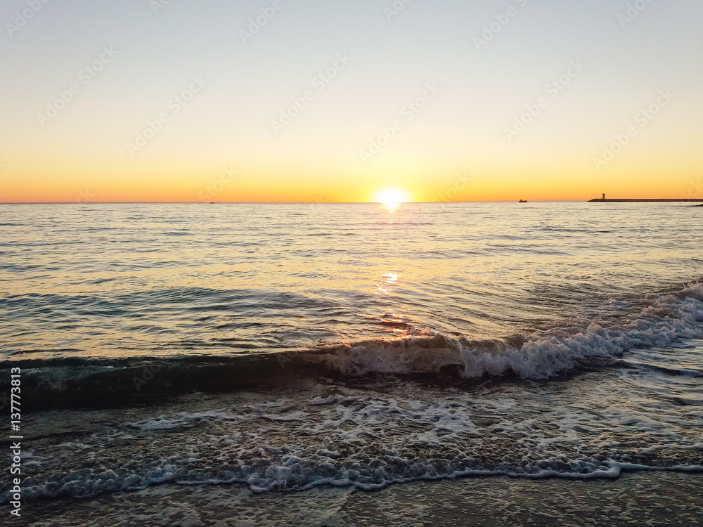 Natural sunshine over sea ocean water background surface