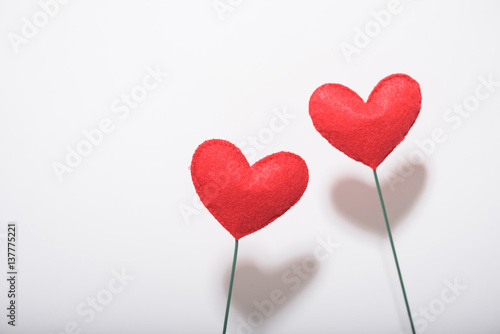 Valentines day and love concept.Couple of red heart shape decoration on white background.