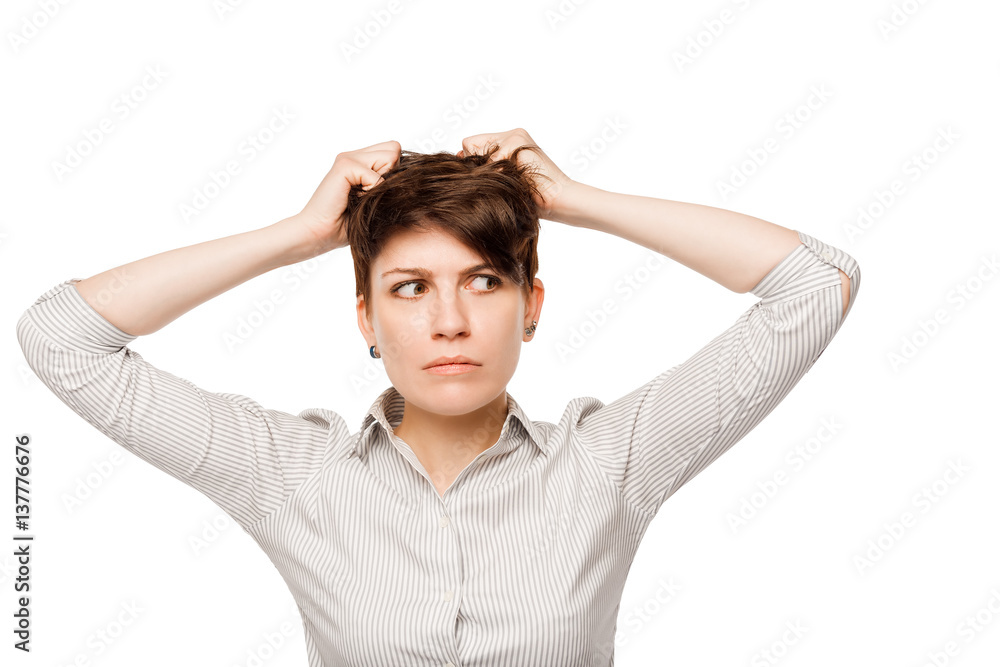 pensive woman with a bunch of problems clasped her head on a white background pensive woman with a bunch of problems clasped her head on a white background