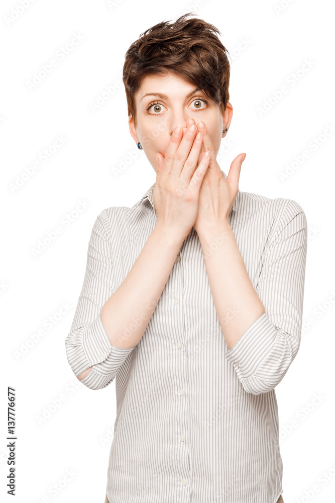 portrait of a young surprised brunette girl on a white background isolated portrait of a young surprised brunette girl on a white background isolated