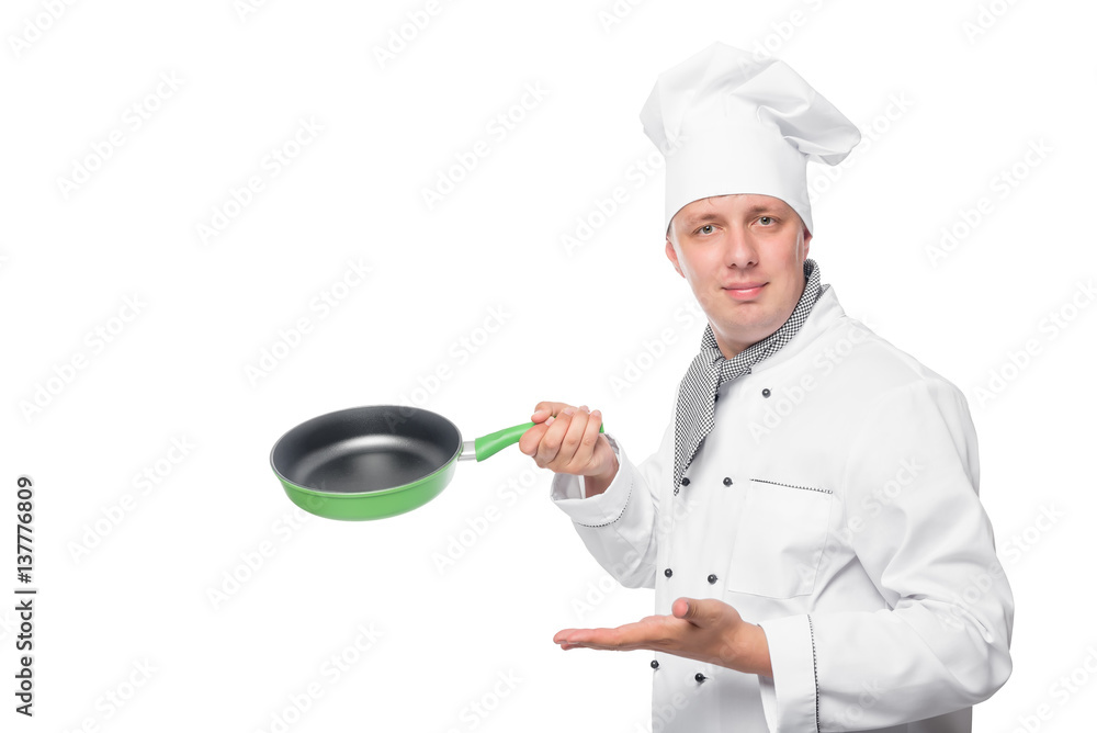 Chef smiling and showing an empty pan on a white background Chef smiling and showing an empty pan on a white background