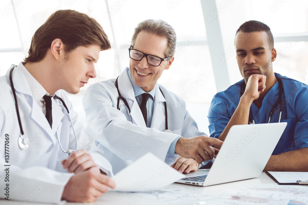 Handsome doctors working