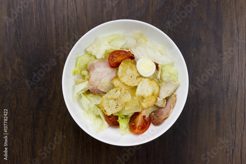 Caesar salad delicious healthy food tomatoes croutons Parmesan cheese and fresh mozzarella