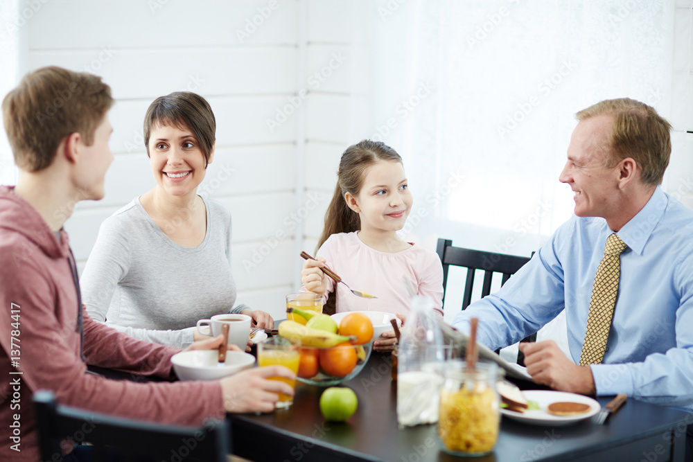 Modern family having sustainable food for breakfast Modern family having sustainable food for breakfast