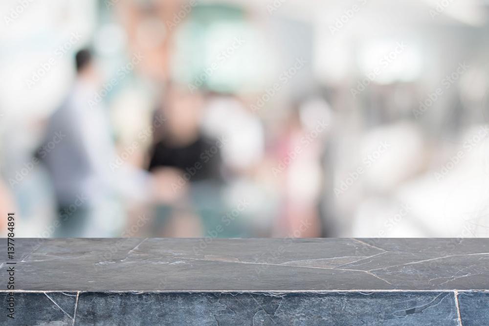 Stone table top and blurred restaurant interior background with vintage filter - can used for display or montage your products. Stone table top and blurred restaurant interior background with vintage filter - can used for display or montage your products.