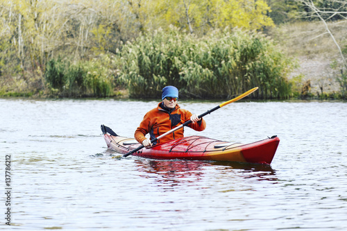 A couple kayaking on Crescent Lake in Olympic Park, USA