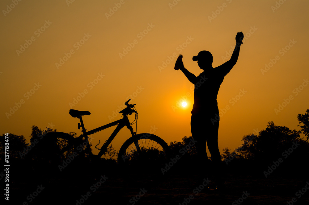 Silhouettes of mountain bike with man in action something Silhouettes of mountain bike with man in action something