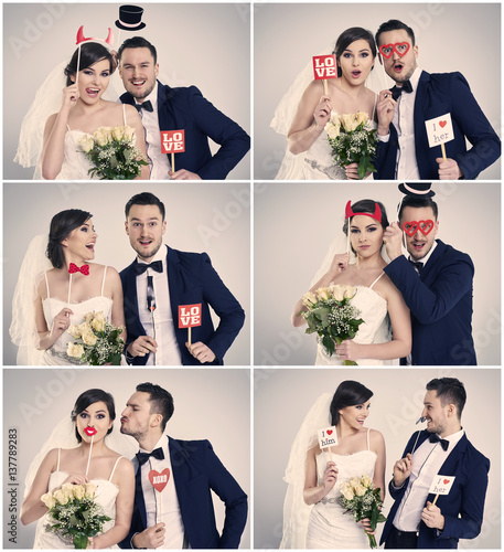 Bride and bridegroom making funny faces in photo booth