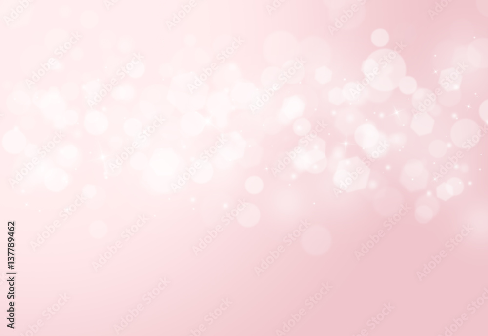 Pink sparkles glitter and rays lights bokeh abstract valentine background/texture.