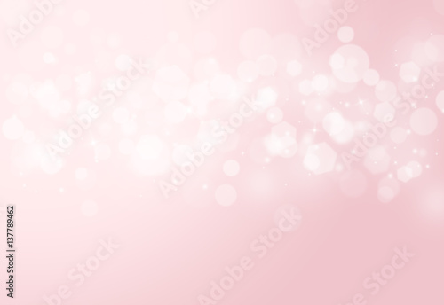 Pink sparkles glitter and rays lights bokeh abstract valentine background/texture.