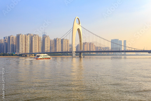 Modern bridge in Zhujiang River and modern building of financial district in guangzhou city, China