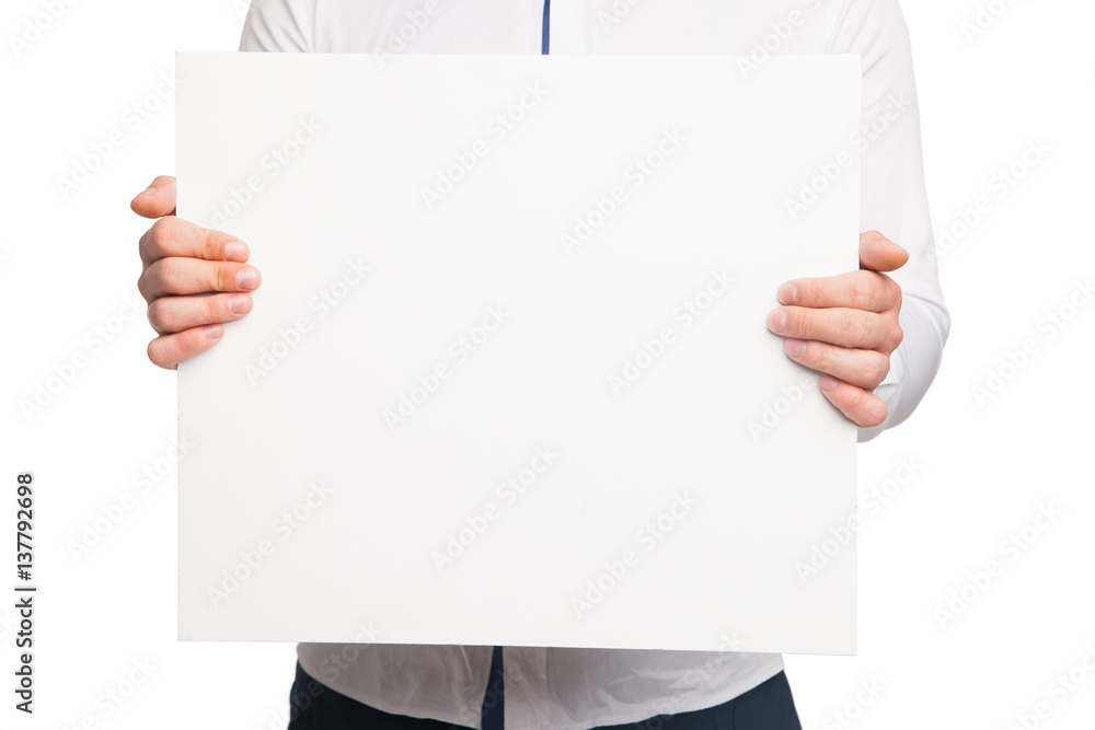 close up of man hands showing white blank board close up of man hands showing white blank board