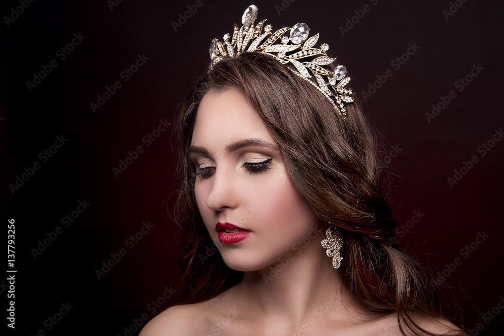 Beautiful girl with a tiara on her head Beautiful girl with a tiara on her head