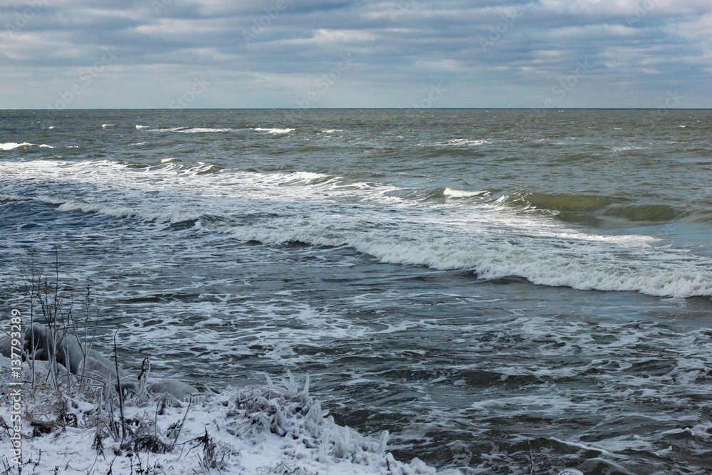 Fototapeta premium View of the Baltic Sea in the winter during a strong wind.