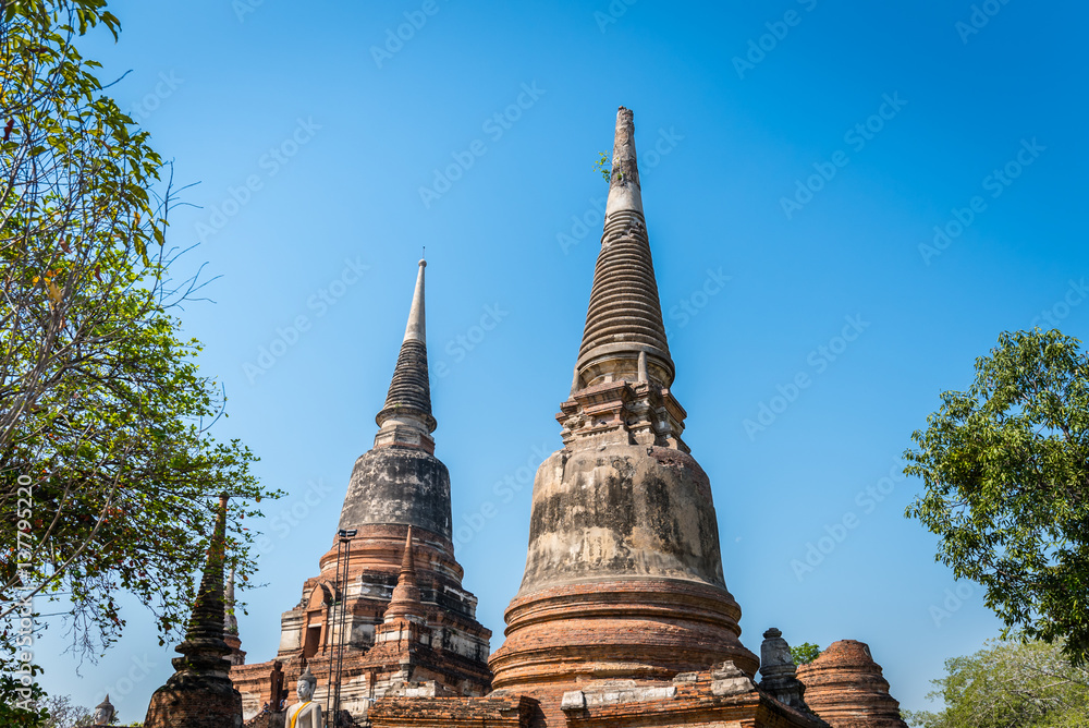 Fototapeta premium Wat Yai Chai Mongkol in Ayutthaya Historical Park . Highlight of the monastery is its very large imposing prang dominating the area. Wat Yai Chai Mongkhon, Ayutthaya, Thailand