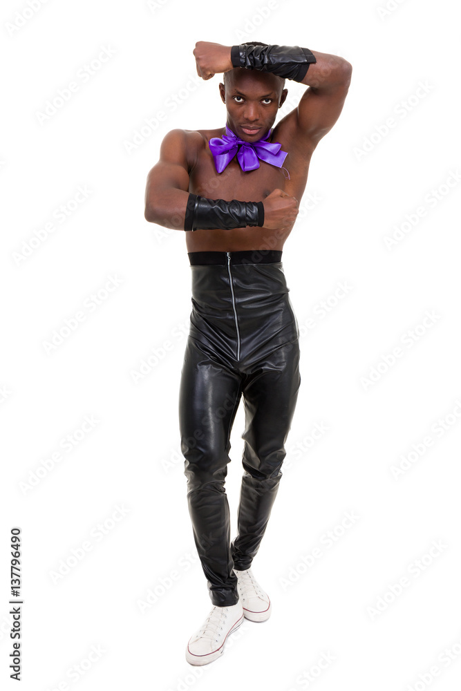 Full length of friendly smiling muscular man posing Full length of friendly smiling muscular man posing