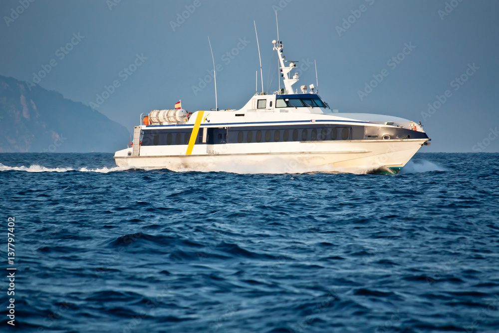 Ferryboat between Ibiza and Formentera. Mediterranean transportation. Tourist traffic on Balearic Islands.