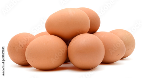 Organic brown eggs isolated on white background