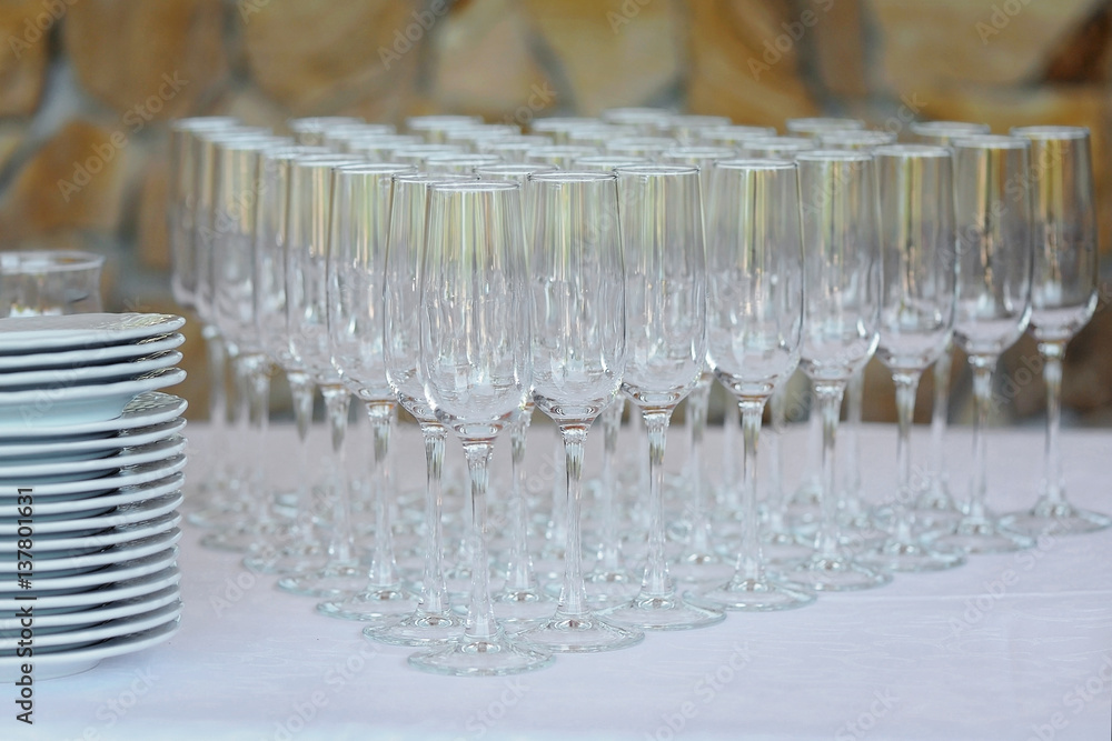Many empty glasses on a table, closeup