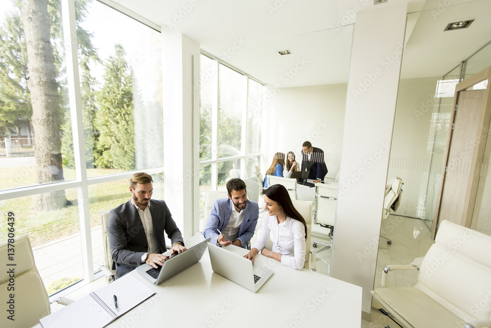 Young business people in the modern office Young business people in the modern office