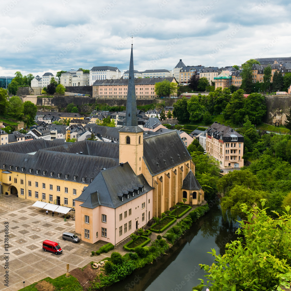 View on the Grund district of Luxembourg City with Neumuenster Abbey and Alzette river