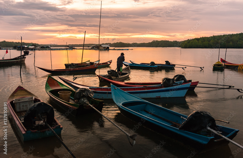 Many small fishing boat  and wonderful sunset ,Thailand