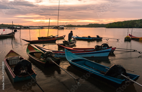 Many small fishing boat and wonderful sunset ,Thailand