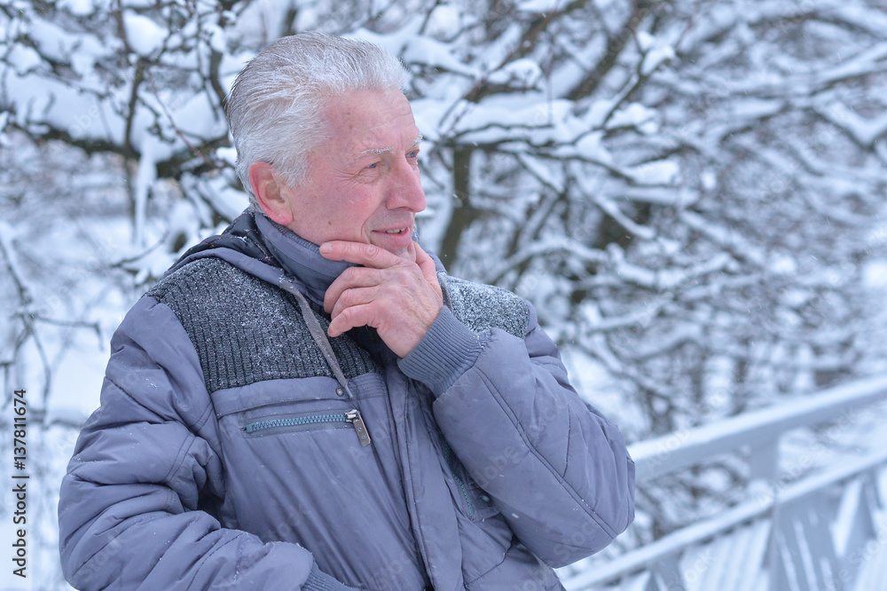 Senior man in snowy winter Senior man in snowy winter