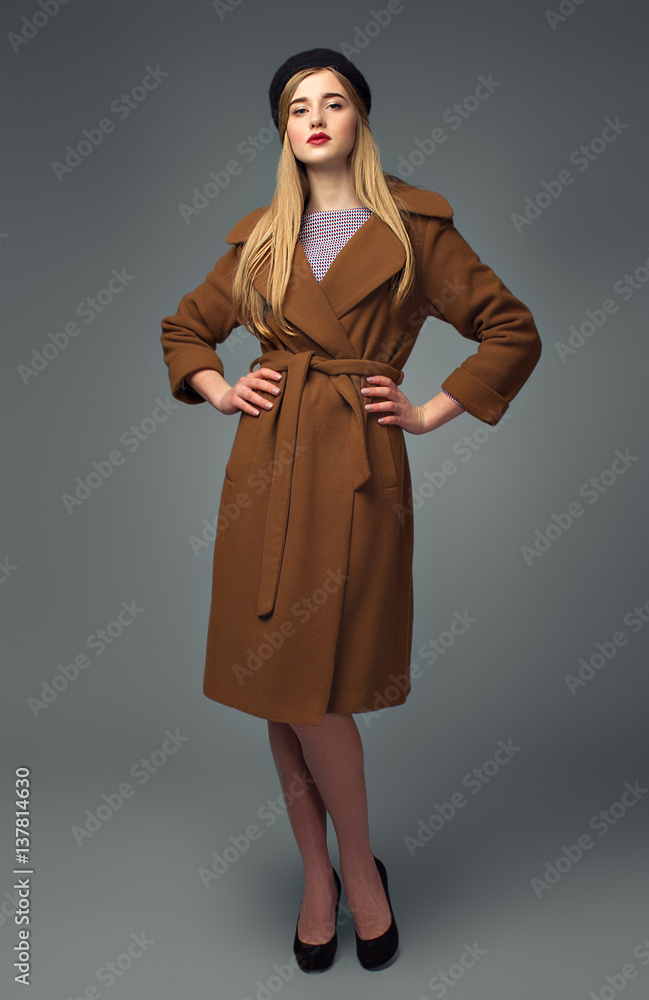 Spring french look. Gir in coat and beret. Chic Spring french look. Gir in coat and beret. Chic