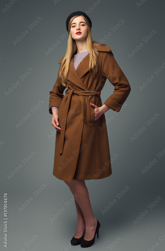 Spring french look. Gir in coat and beret. Chic and business style Spring french look. Gir in coat and beret. Chic and business style