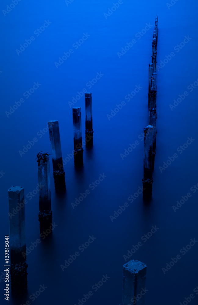 Wooden posts on the sea Wooden posts on the sea