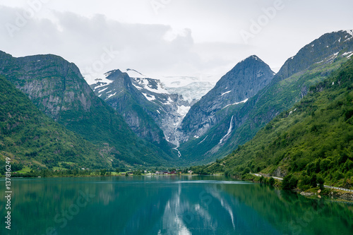 Briksdalsbreen glacier view from the fjord water. © AlexanderNikiforov