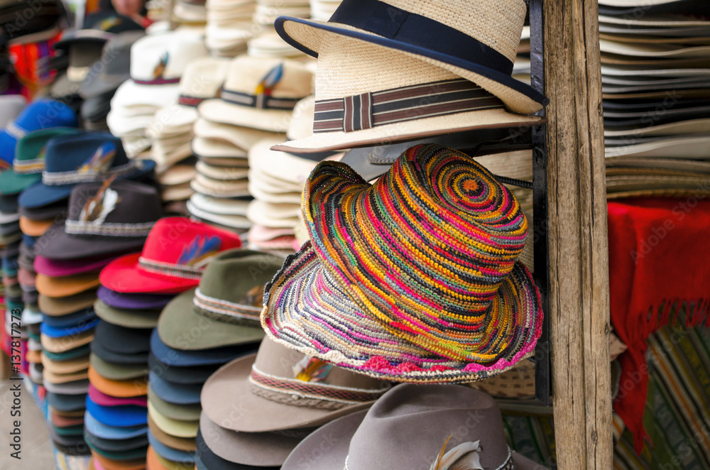 Numerous hats at the market