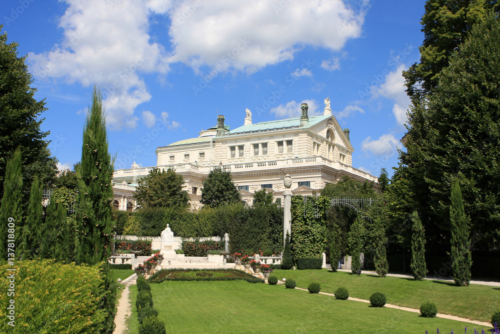 View of the Volksgarten People`s Garden with historic Burgtheater in the background, Vienna, Austria