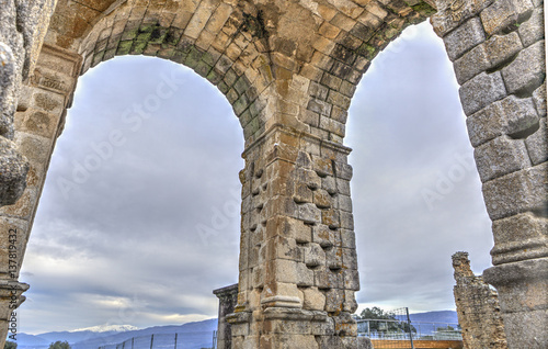 Three pillars of Roman Arch of Caparra, Caceres, Spain