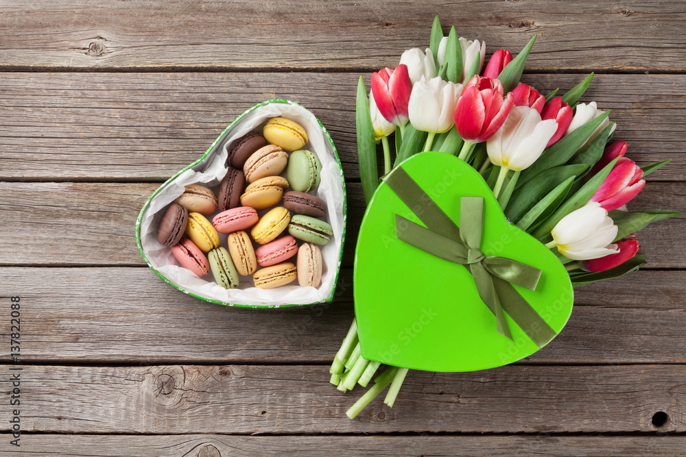 Colorful tulips bouquet and macaroons