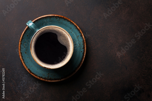 Coffee cup on old kitchen table