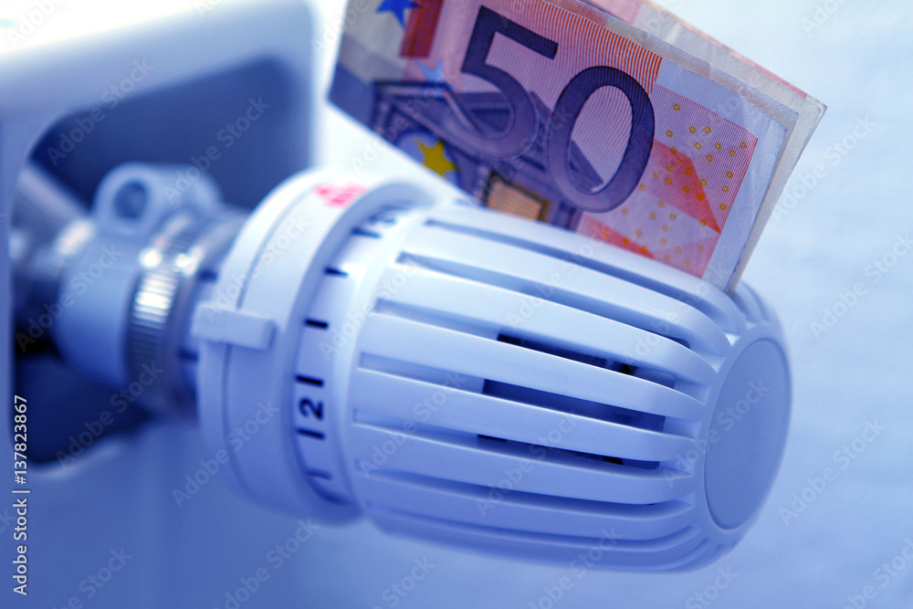 Symbol photo heating cost, heating thermostat and 50 Euro Bill Symbol photo heating cost, heating thermostat and 50 Euro Bill